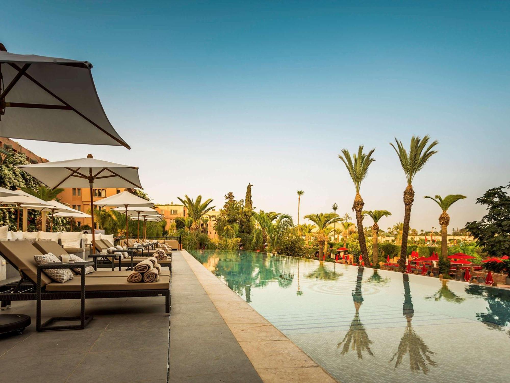 Sofitel Marrakech Palais Imperial & Spa Марракеш Экстерьер фото The pool at the Four Seasons Hotel Marrakech