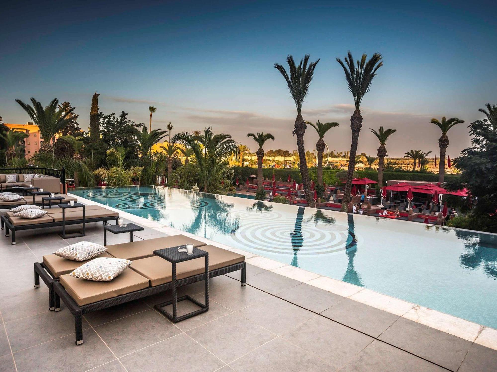 Sofitel Marrakech Palais Imperial & Spa Марракеш Экстерьер фото The pool at the hotel