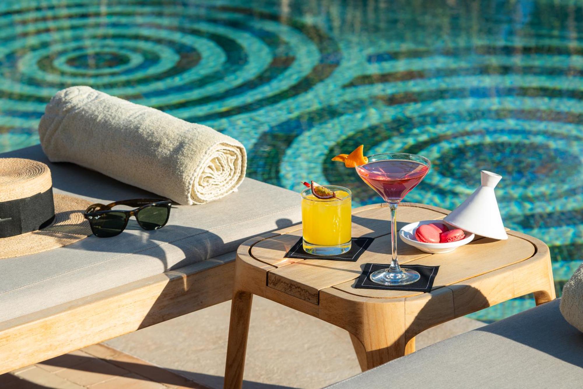Sofitel Marrakech Palais Imperial & Spa Марракеш Экстерьер фото Poolside at the hotel